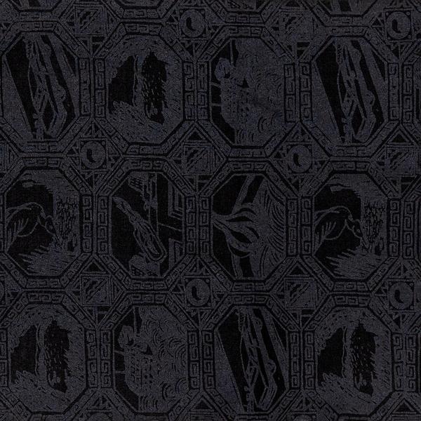 A detail of a charcoal black scarf with a grid of octagonal vignettes also printed in black. Each features an abstract composition of a car, hot air balloon, and other scenes.