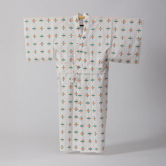 Hand-sewn white yukata with cross designs adorning the garment in orange and green. Woman's design has a solid horizontal line in the cross. An obi (sash) also accompanies the garment.