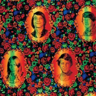 Wallpaper featuring yearbook portraits in bright, colorful vignettes amid a background of roses in highly saturated red, blue, green, and orange.