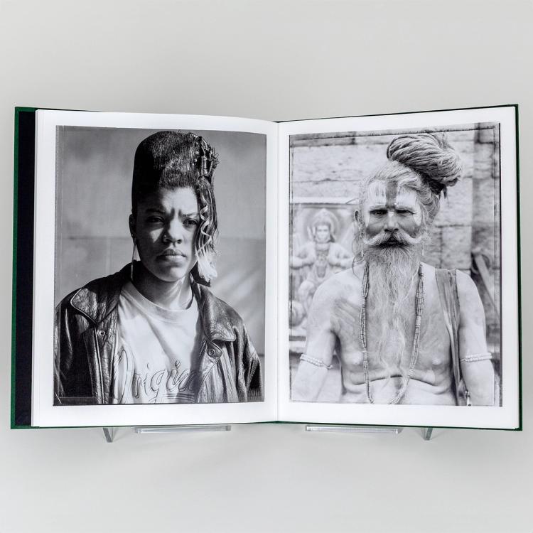 Open book displaying two black-and-white portraits: on the left, a person in a leather jacket with a high, styled haircut; on the right, a bearded person with body paint and long hair tied up, wearing beaded necklaces.