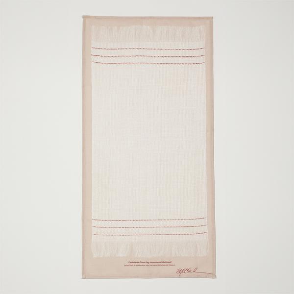A print of a cream-colored dishtowel, longer than it is wide, with three red stripes and fringe on each end. The print is on a beige background and is signed by the artist, Sonya Clark.