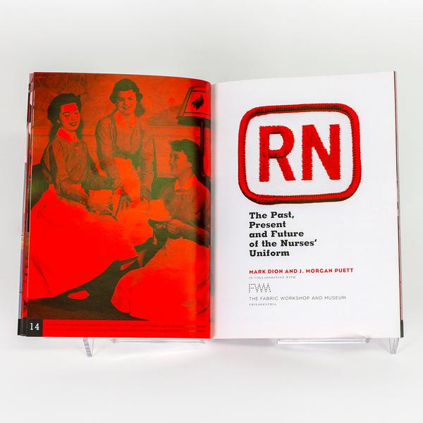 A title page spread for a book entitled "RN: The Past, Present, and Future of The Nurses' Uniform." The 'RN' of the title is embroidered like a uniform patch. The left page features an old photograph of three women nurses with a bright red saturated filter.