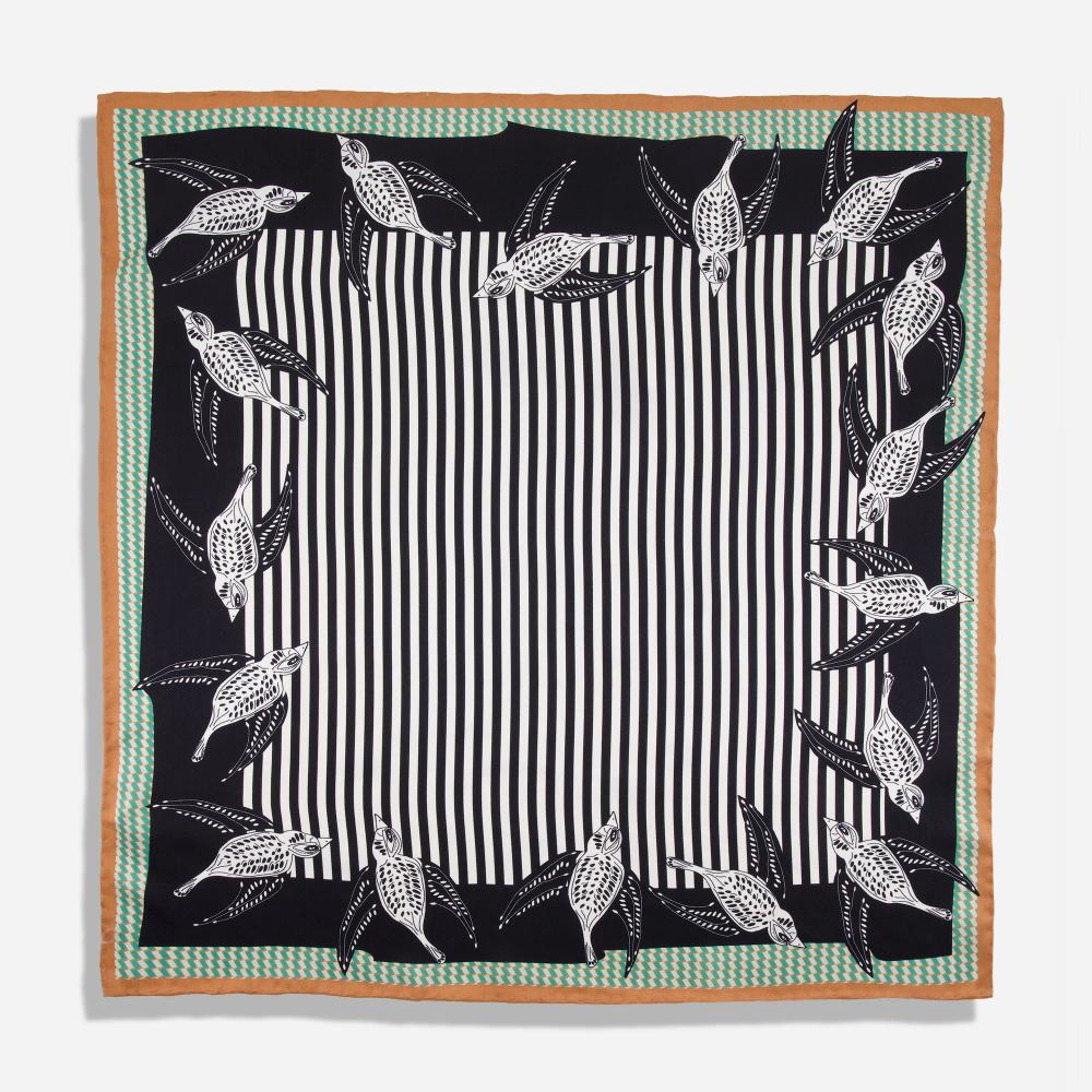A square scarf lined with illustrations of birds over a thick black border encased in thinner green and tan borders. At its center is a series of black and white stripes.