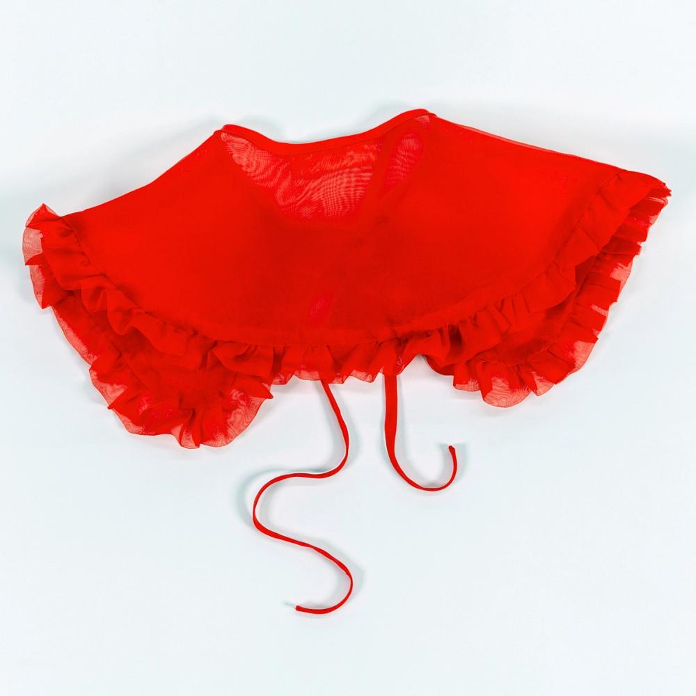 The back side of a red silk organza removable collar is sitting against a white background. The collar has a rounded edge and ruffle going all the way around.