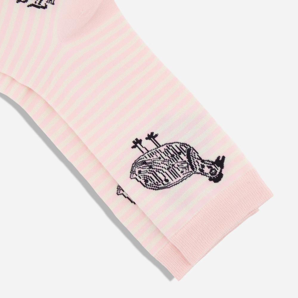 A pair of light pink and white striped knit dress socks with a black illustrated Kuku bird on the ankle of the socks. The artist's signature and "The Tie Bar" logo is featured on the bottom of the socks.