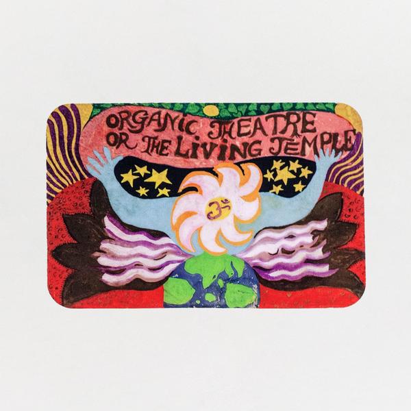 Colorful psychedelic sticker with bold text reading “Organic Theatre or The Living Temple” above a stylized figure with outstretched arms, swirling hair, and cosmic imagery of stars and the Earth.