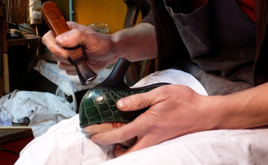 THE MAKER REFINES THE SHOE