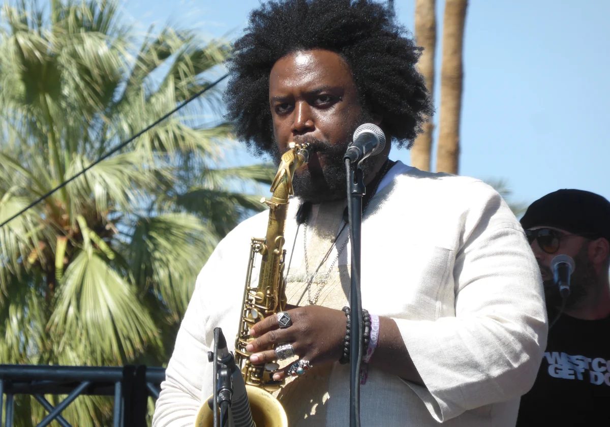 Kamasi Washington performing on tenor saxophone at Coachella in 2016
