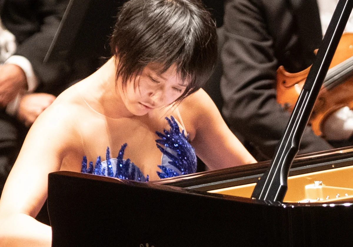 Pianist Yuja Wang performing with an orchestra