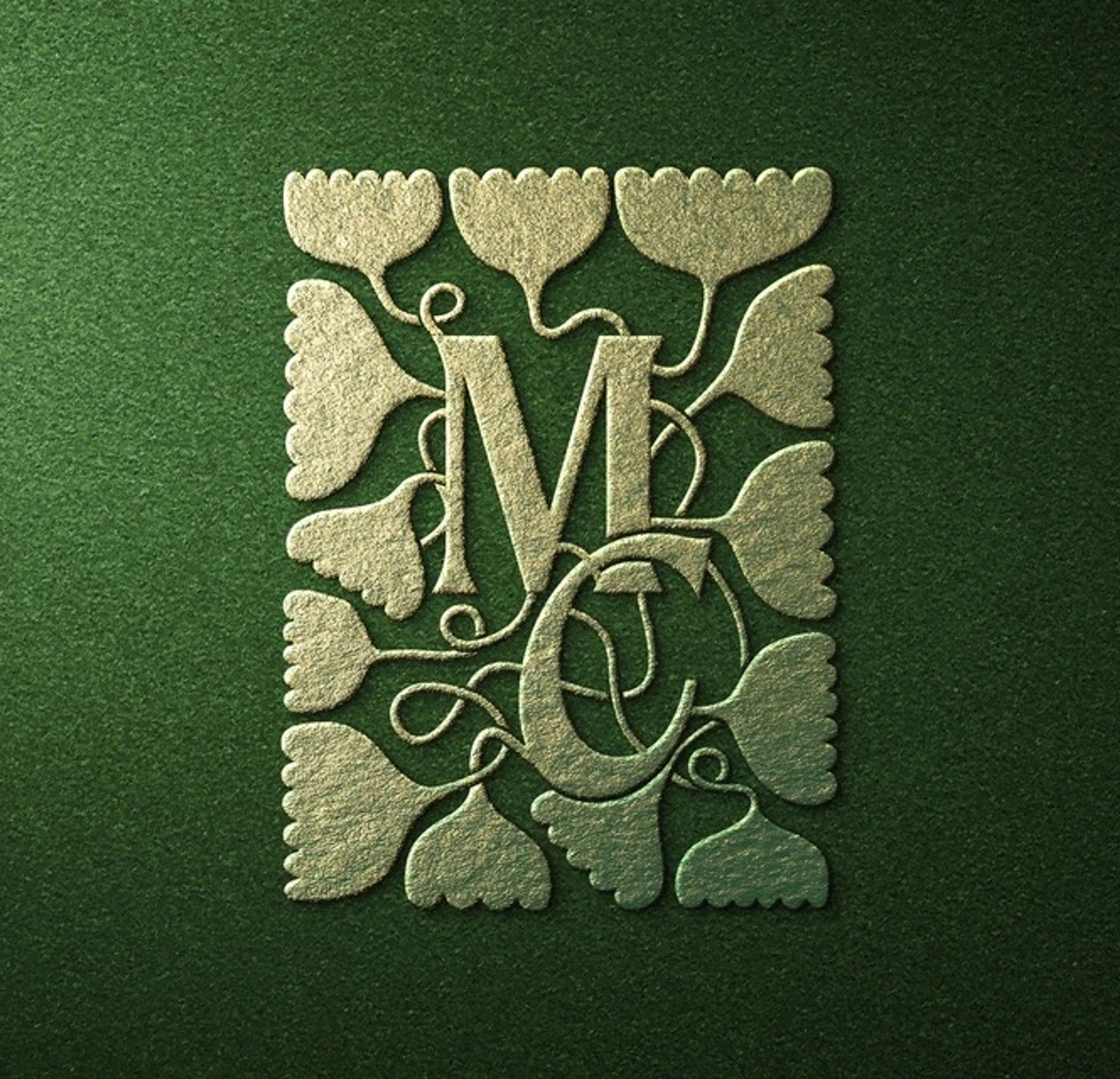 Embossed MC monogram