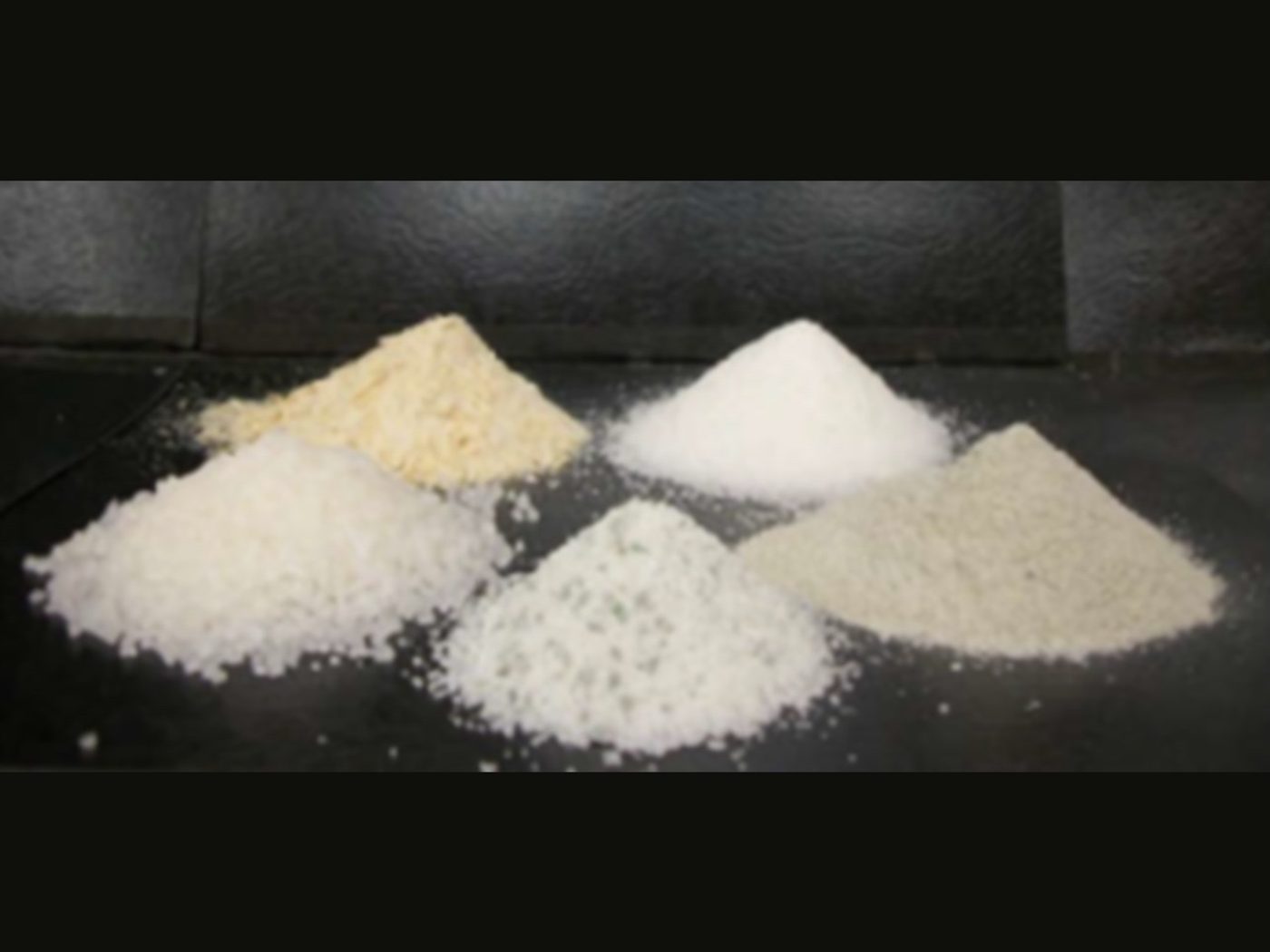 Multiple Ultrabind powder blends matched to different materials