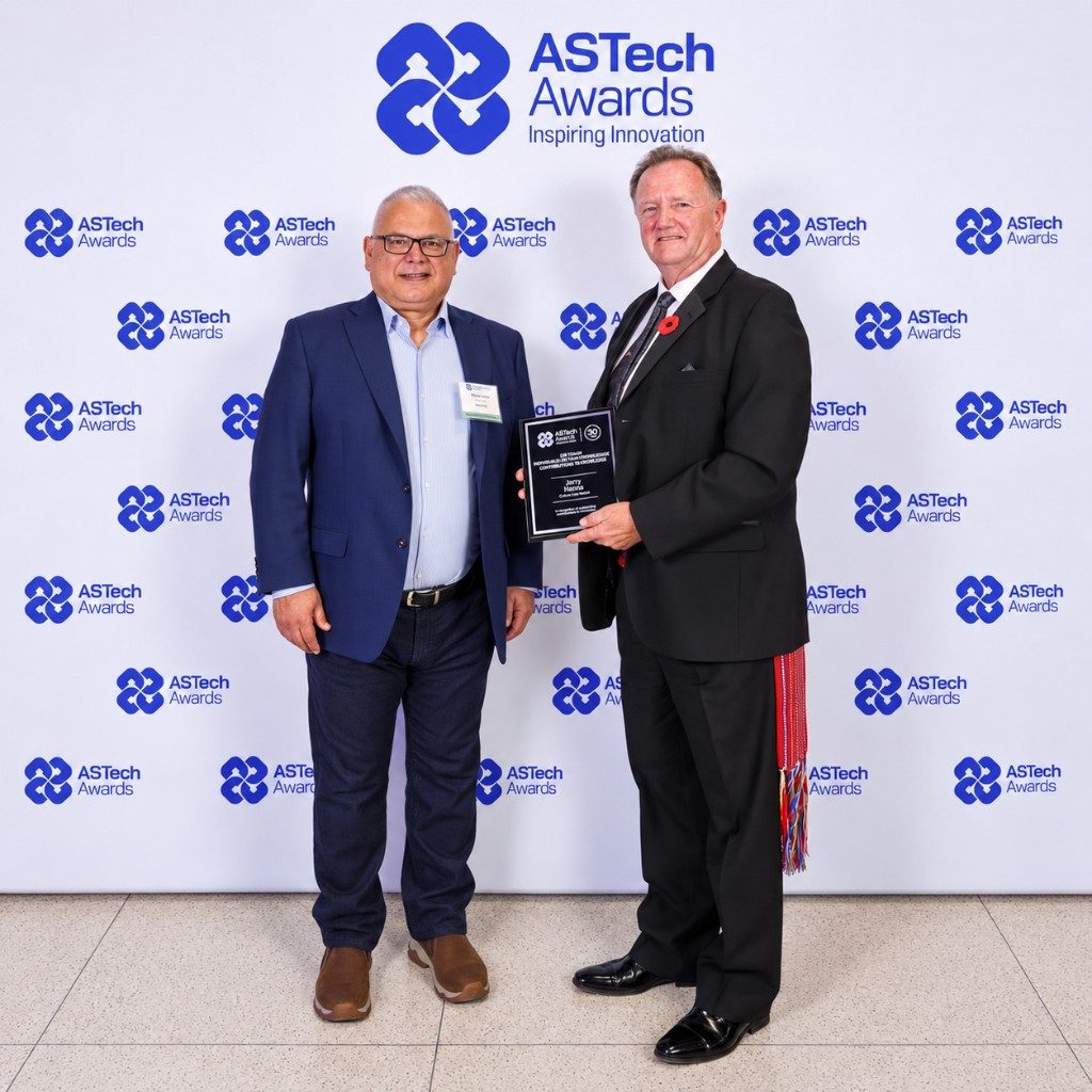 Jerry Hanna receiving the 2019 ASTech Awards Finalist plaque with an awards official