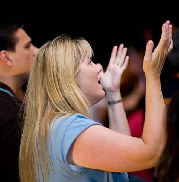 People worshipping at New Wine Church