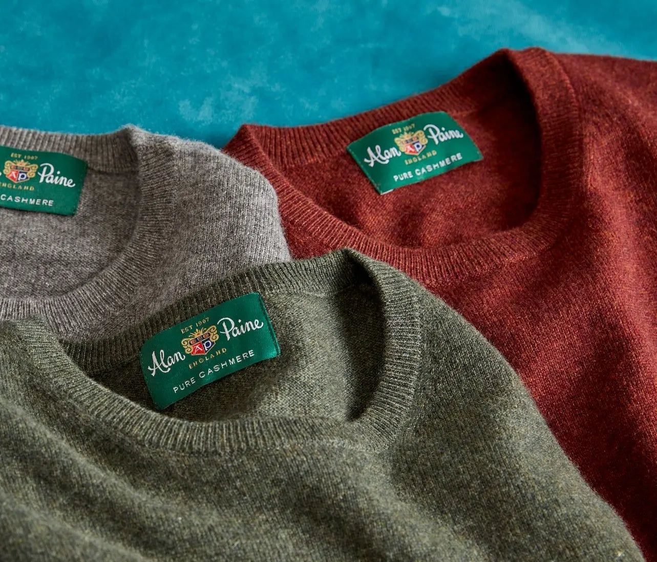Merker Alan Paine hovedbanner
