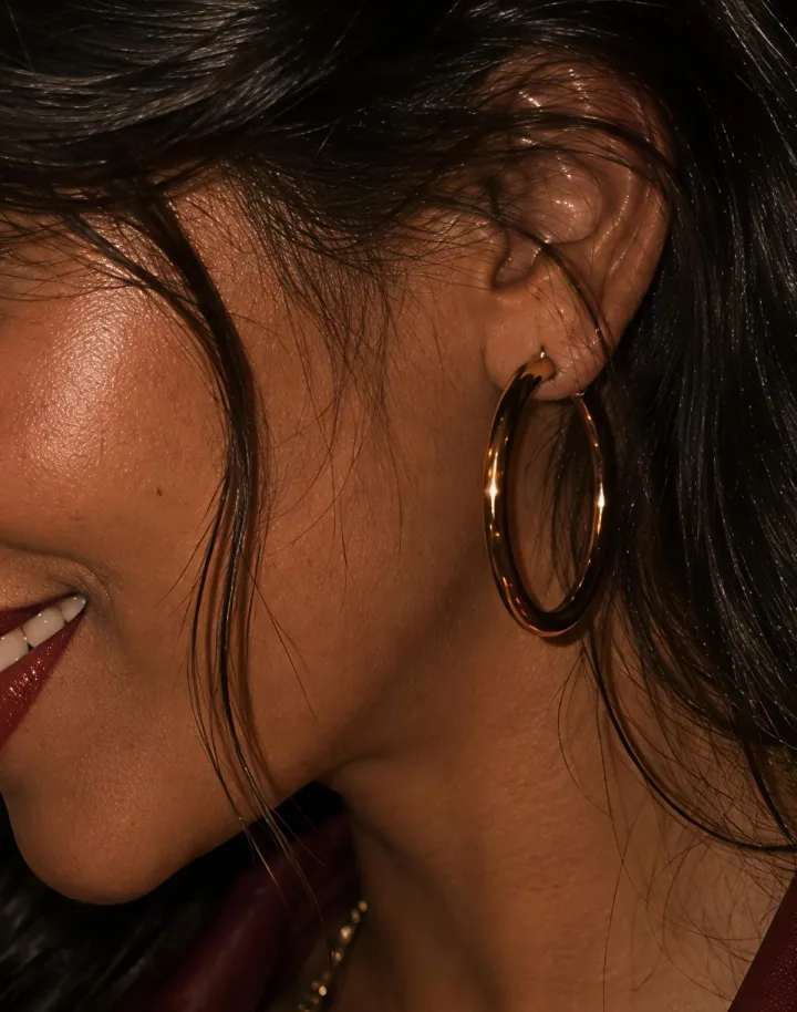 Gold hoop earrings styled by Aurora Noir to recreate Allie Hayes' iconic BookTok-inspired outfit.