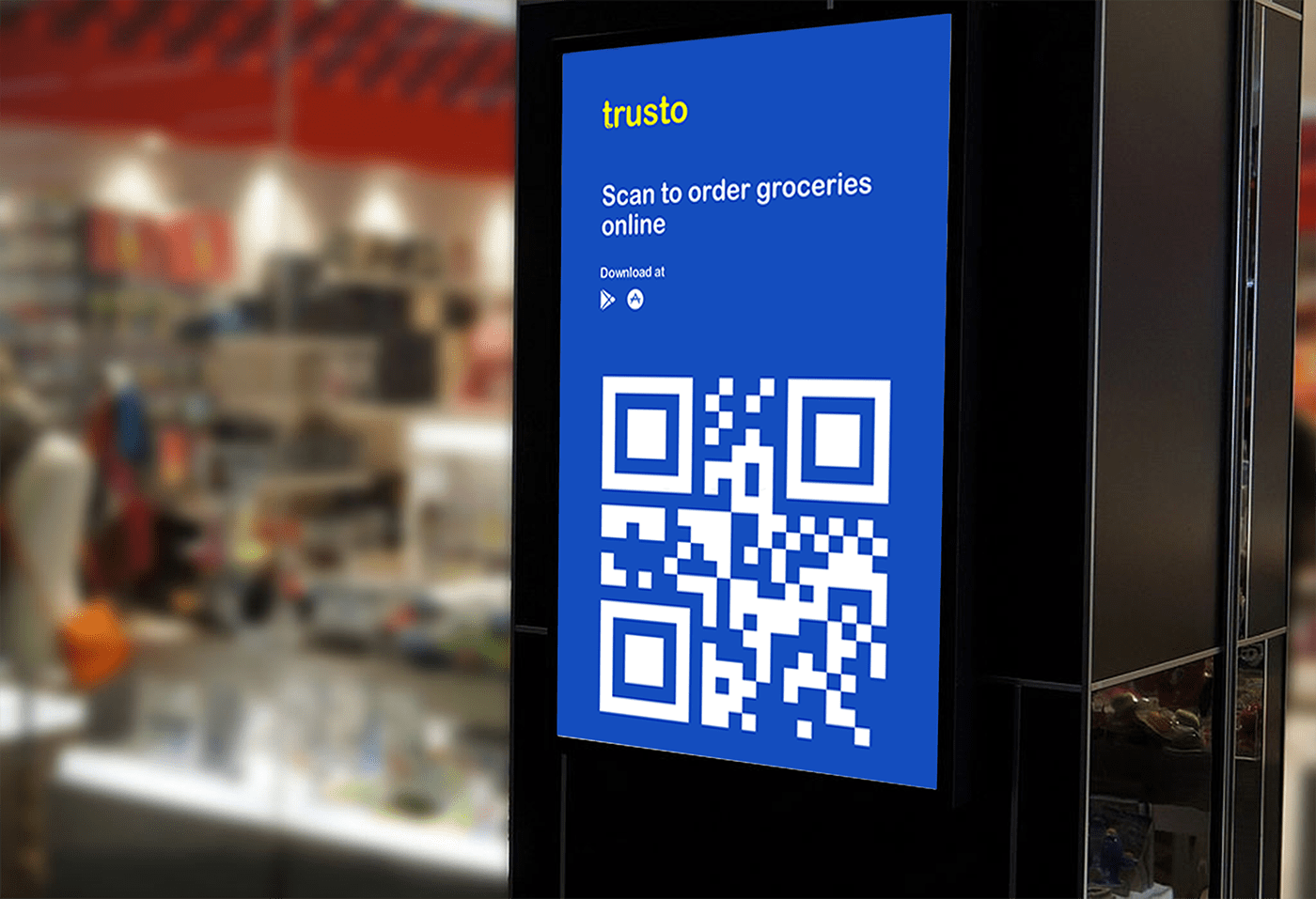 Trusto in-store QR display reading Scan to order groceries online