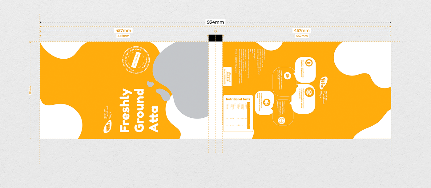 Gudroots packaging dieline in amber and white with Freshly Ground Atta and nutrition information
