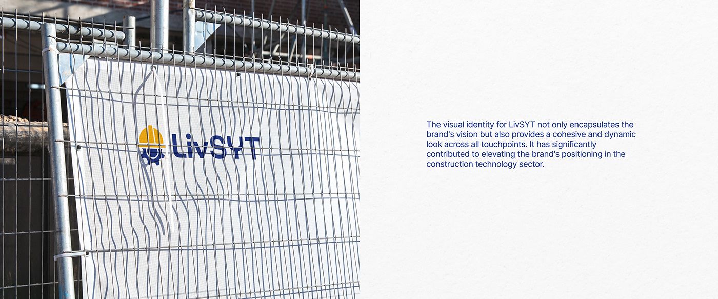 LivSYT banner on a site fence with a short brand statement