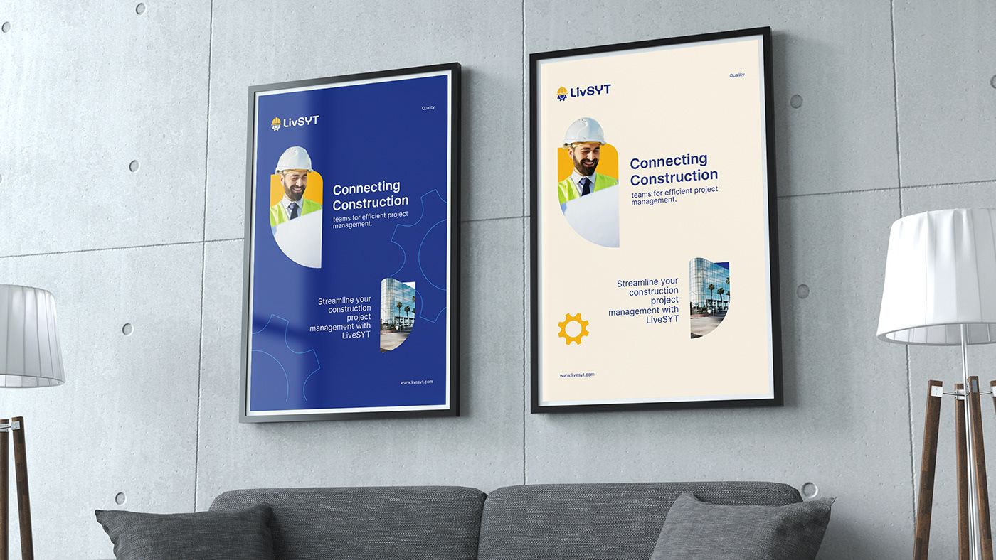Two LivSYT posters in navy and cream on a concrete wall above a sofa