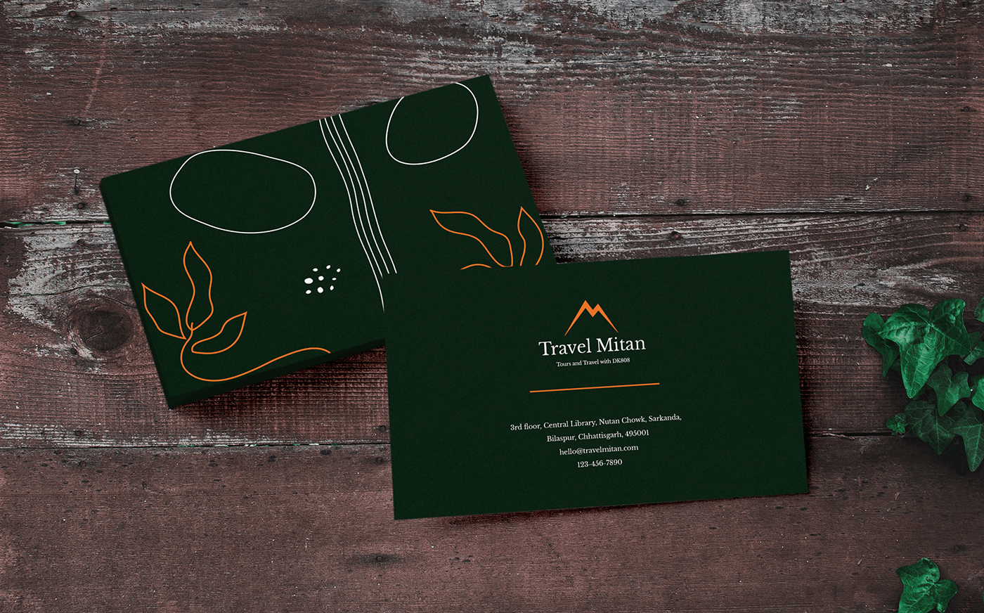 Travel Mitan business cards in dark green with leaf and shape illustrations