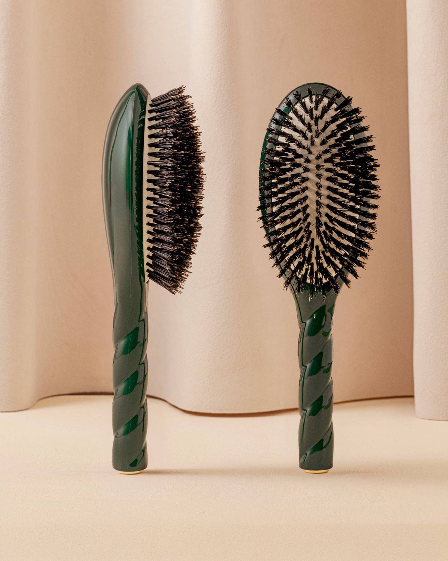 Two La Bonne Brosse N.01 brushes in emerald green, back and bristle side