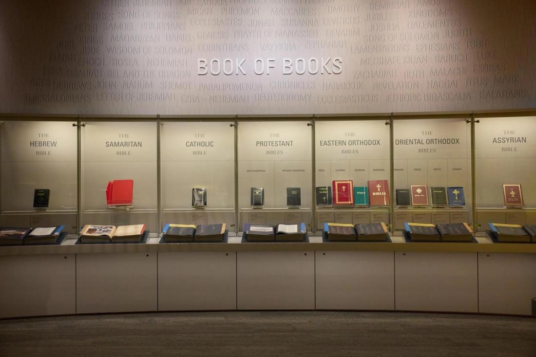 The "Book of Books" exhibit at the Museum of the Bible displays Hebrew, Samaritan, Catholic, Protestant, Eastern Orthodox, Oriental Orthodox, and Assyrian Bible traditions.