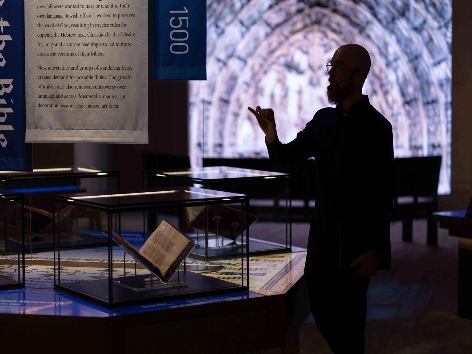 Michael McAfee teaches beside historic Bible manuscripts inside the Museum of the Bible in Washington, D.C.