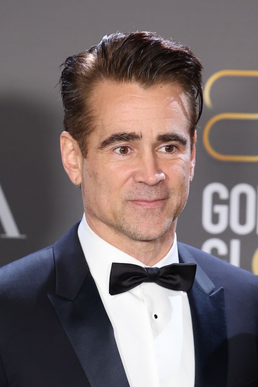 80th Annual Golden Globe Awards - Press Room BEVERLY HILLS, CALIFORNIA - JANUARY 10: Colin Farrell winners of Best Picture - Musical/Comedy for "The Banshees of Inisherin", pose in the press room during the 80th Annual Golden Globe Awards at The Beverly Hilton on January 10, 2023 in Beverly Hills, California. (Photo by Daniele Venturelli/WireImage) mens hairstyles