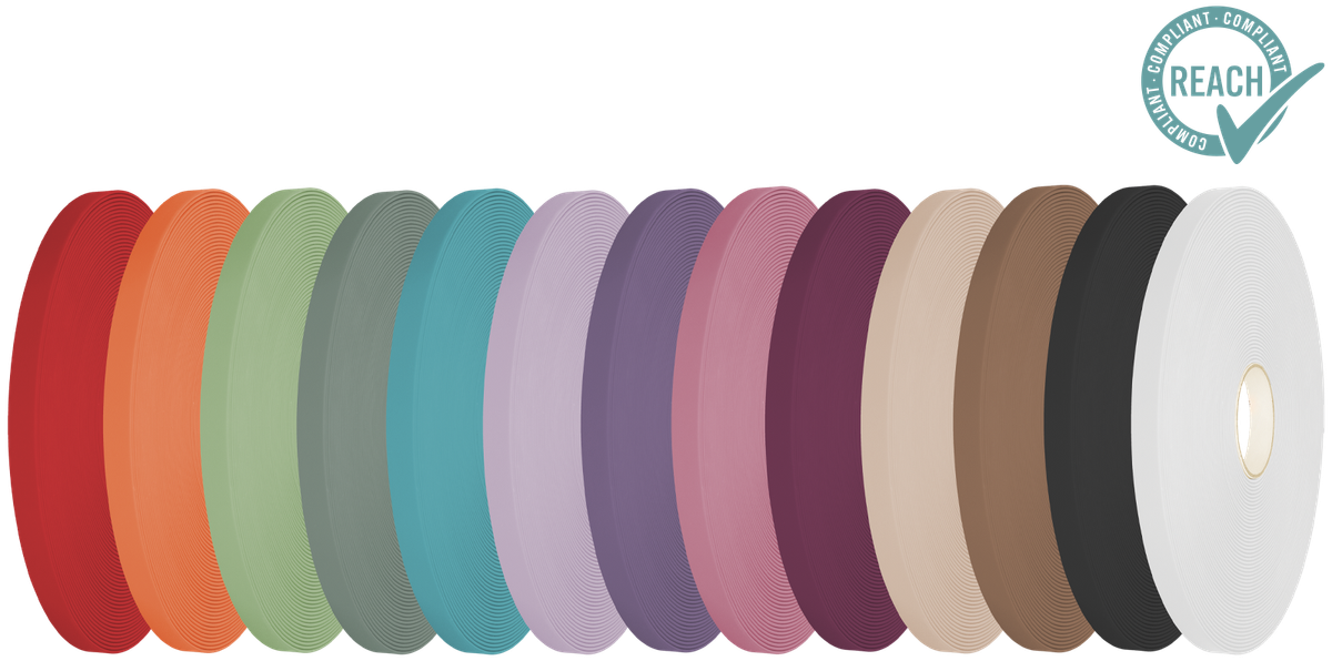 a row of different colored circles on a black background