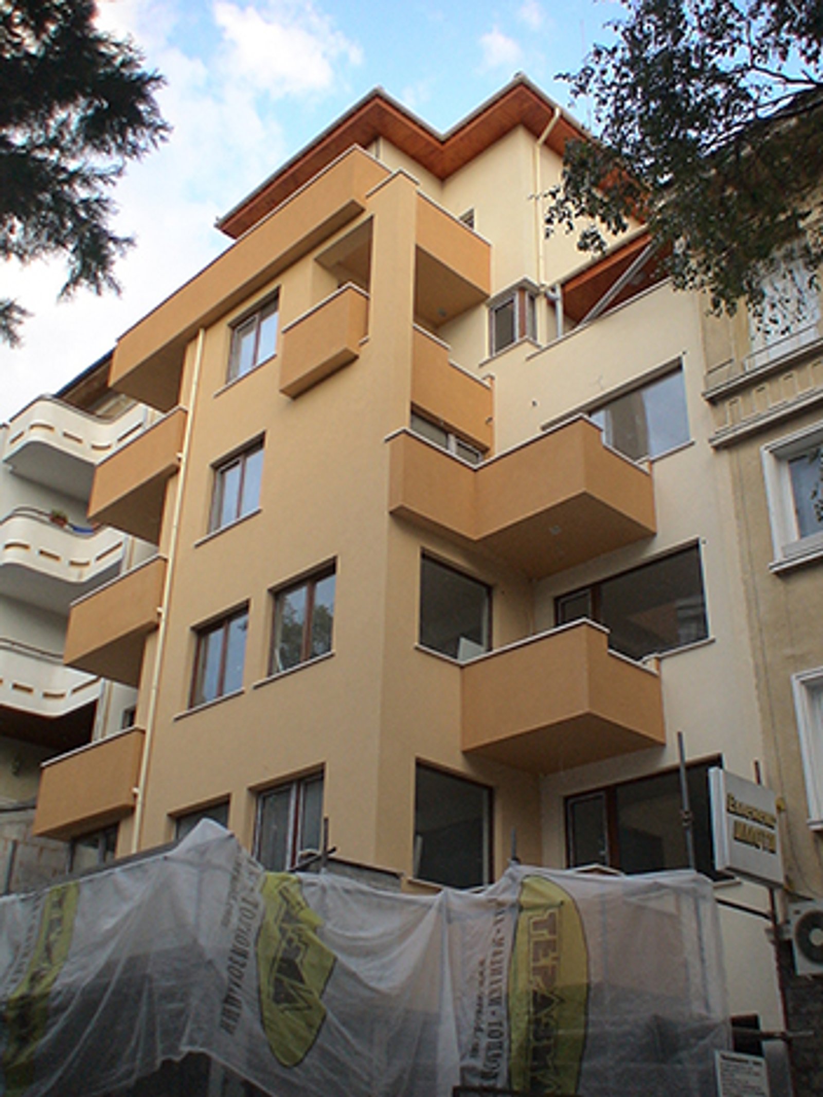 Three-five - storey residential building with underground garages and places for trade activity 1