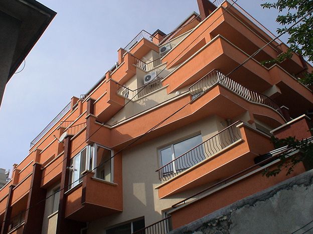 Six - storey residential building with underground garages and places for trade activity 1