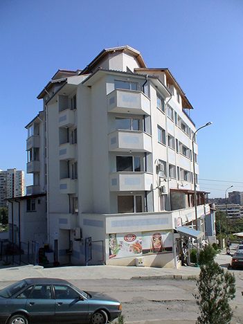 Five - storey residential building with underground garages and places for trade activity 1