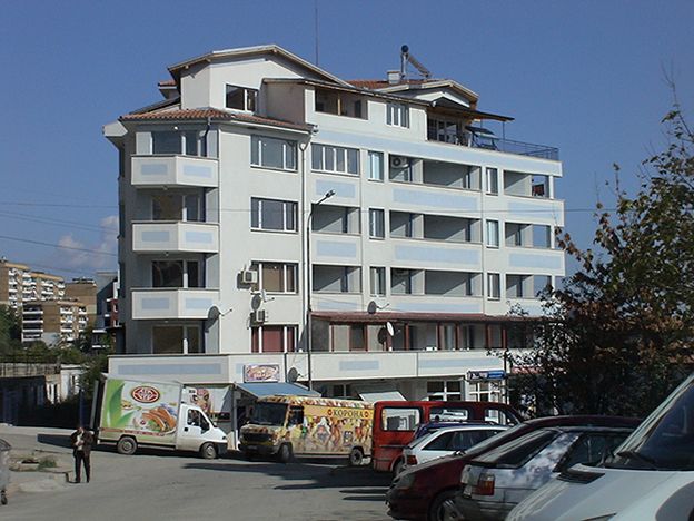 Five - storey residential building with underground garages and places for trade activity 4