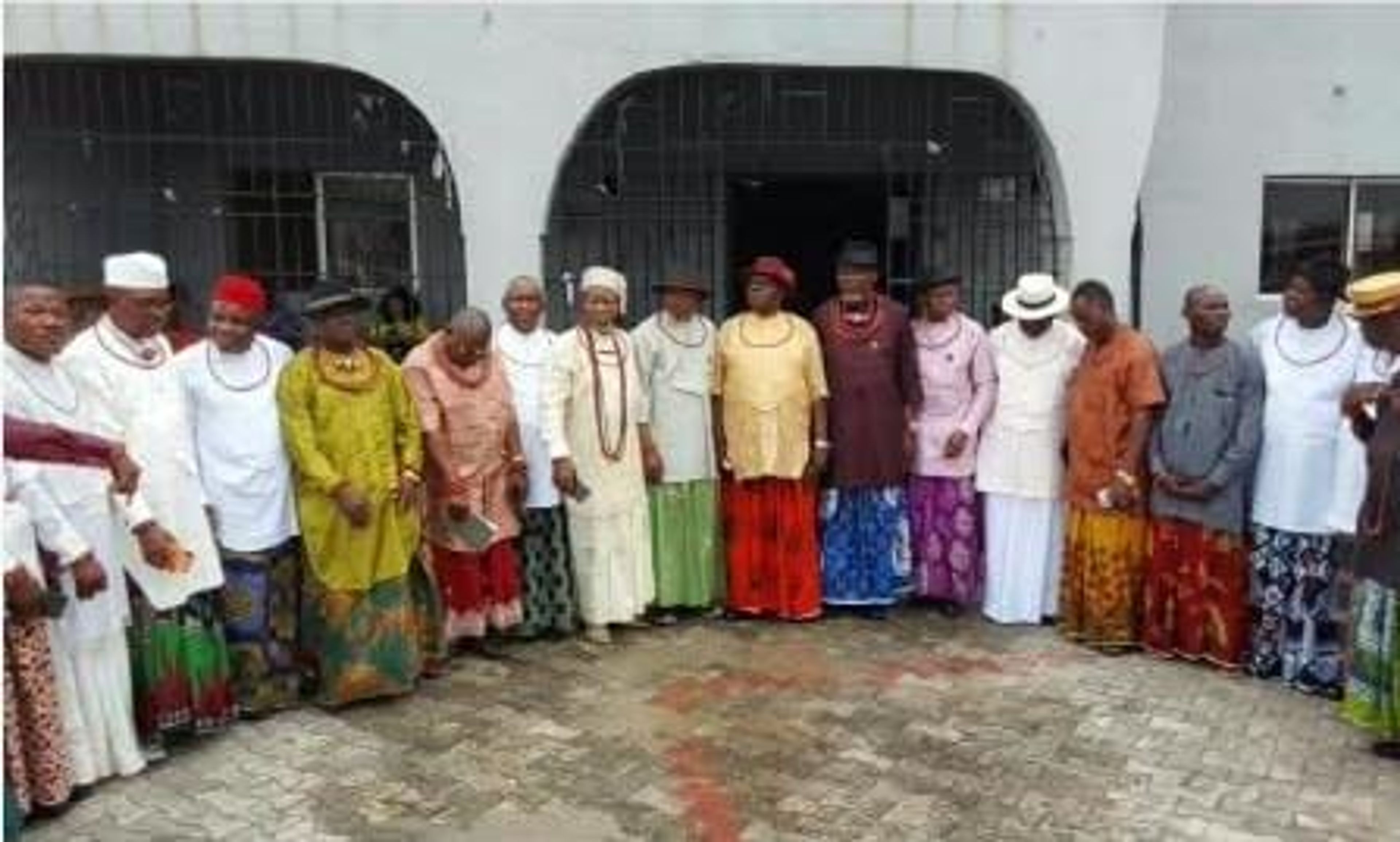 Group of men standing outside dressed in Nigerian Native Attire 