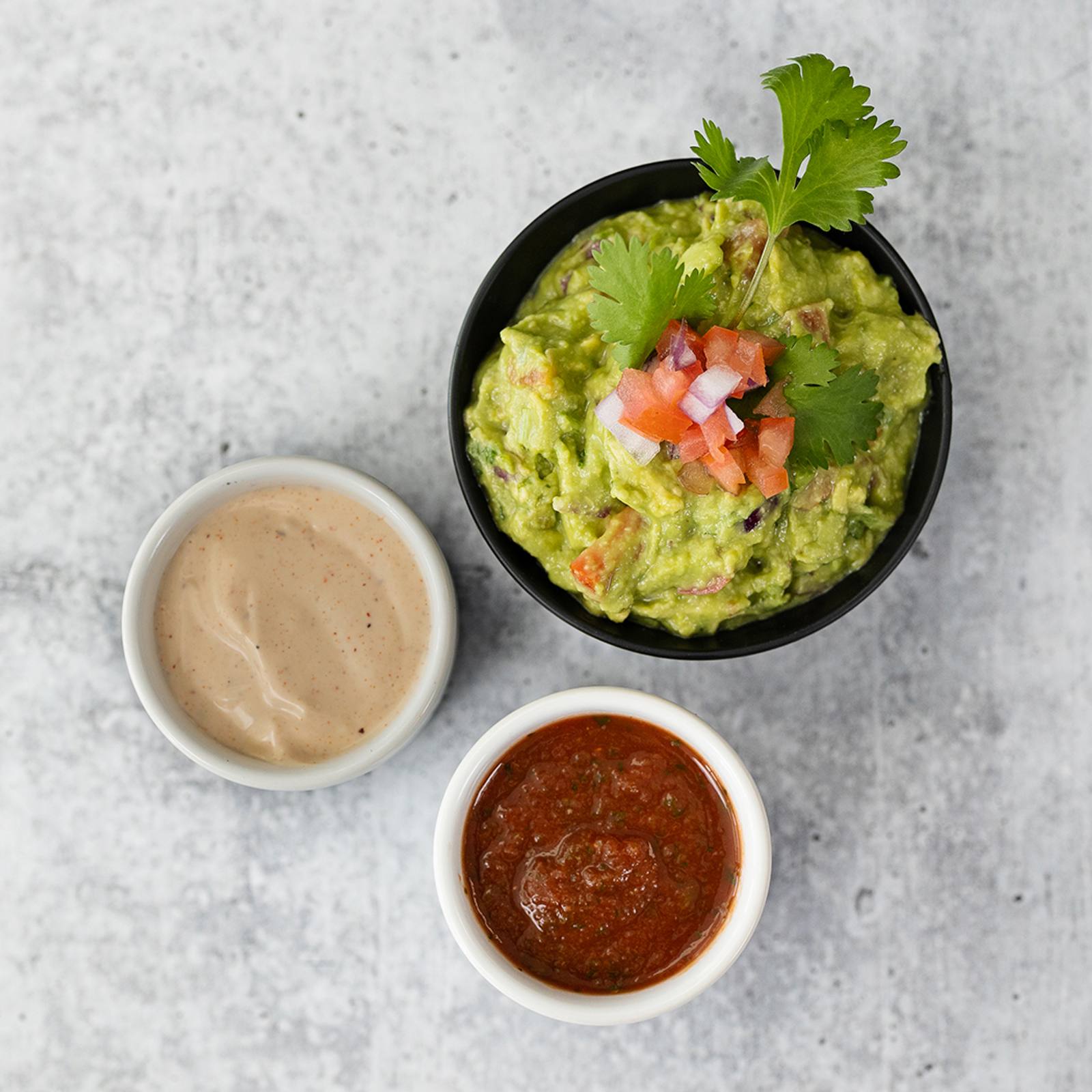 a photo of Take Me Tacos guacamole & sauces