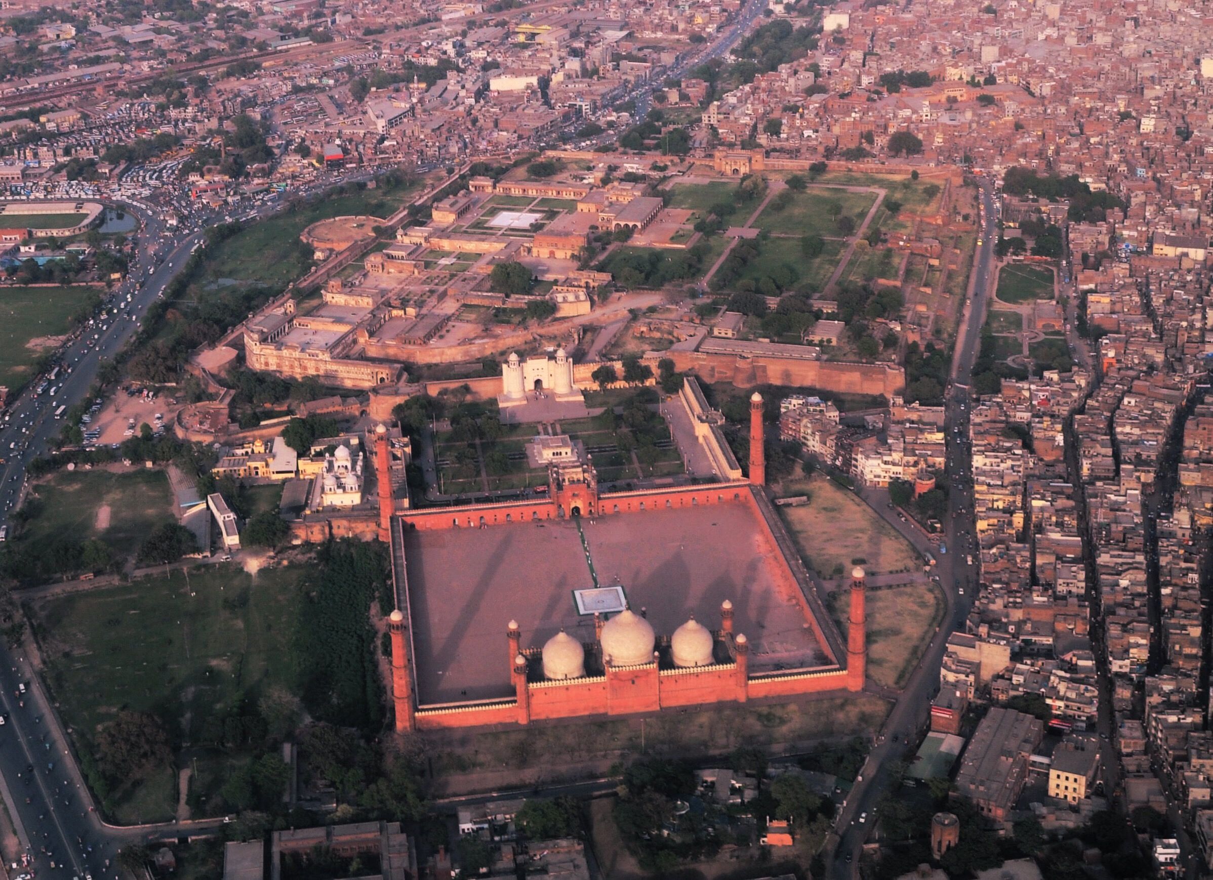 Aerial view of Badshahi Mosque and the dense housing of Lahore around it