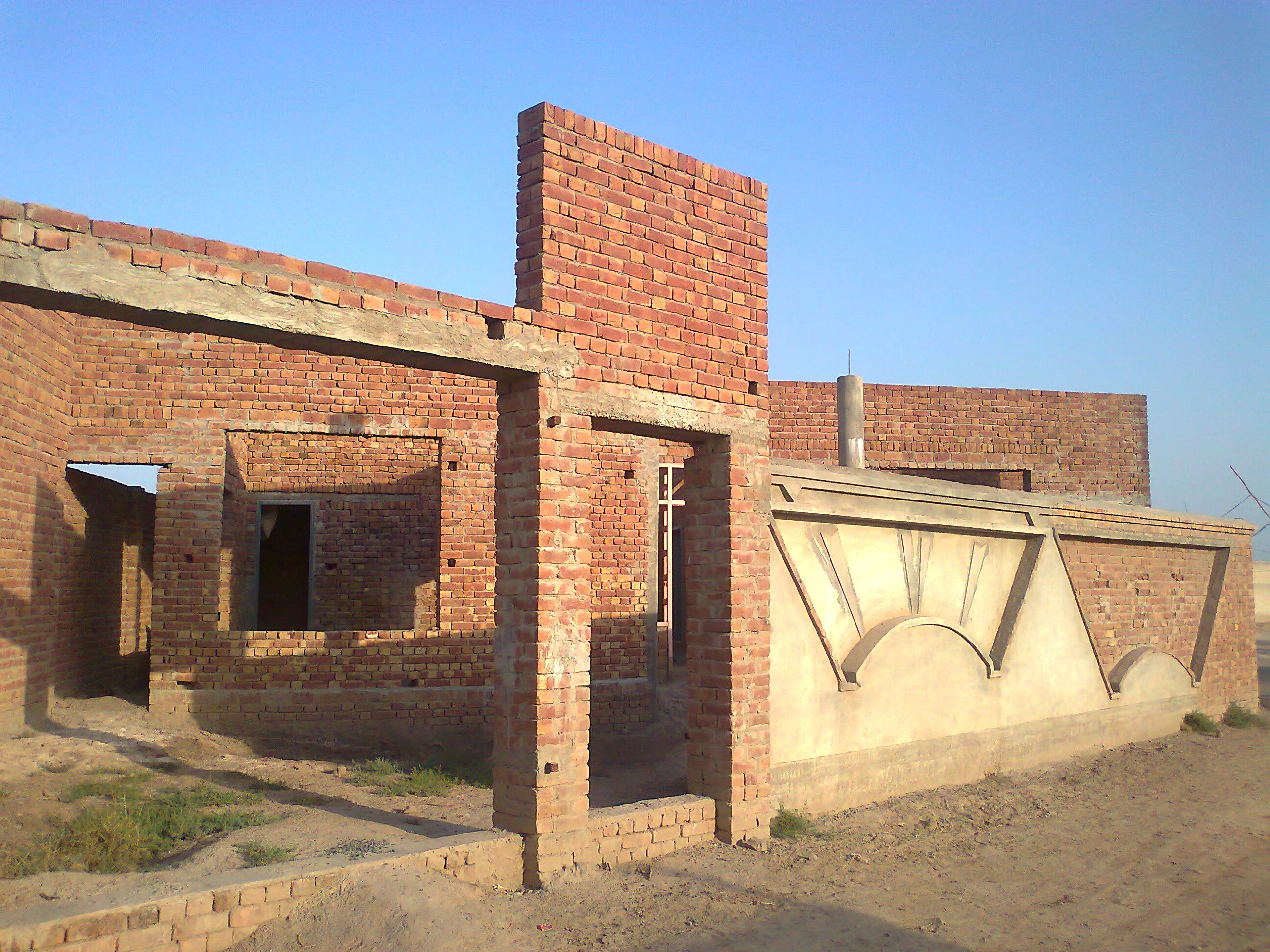 A brick house under construction in Makhdoom Rashid, Multan district