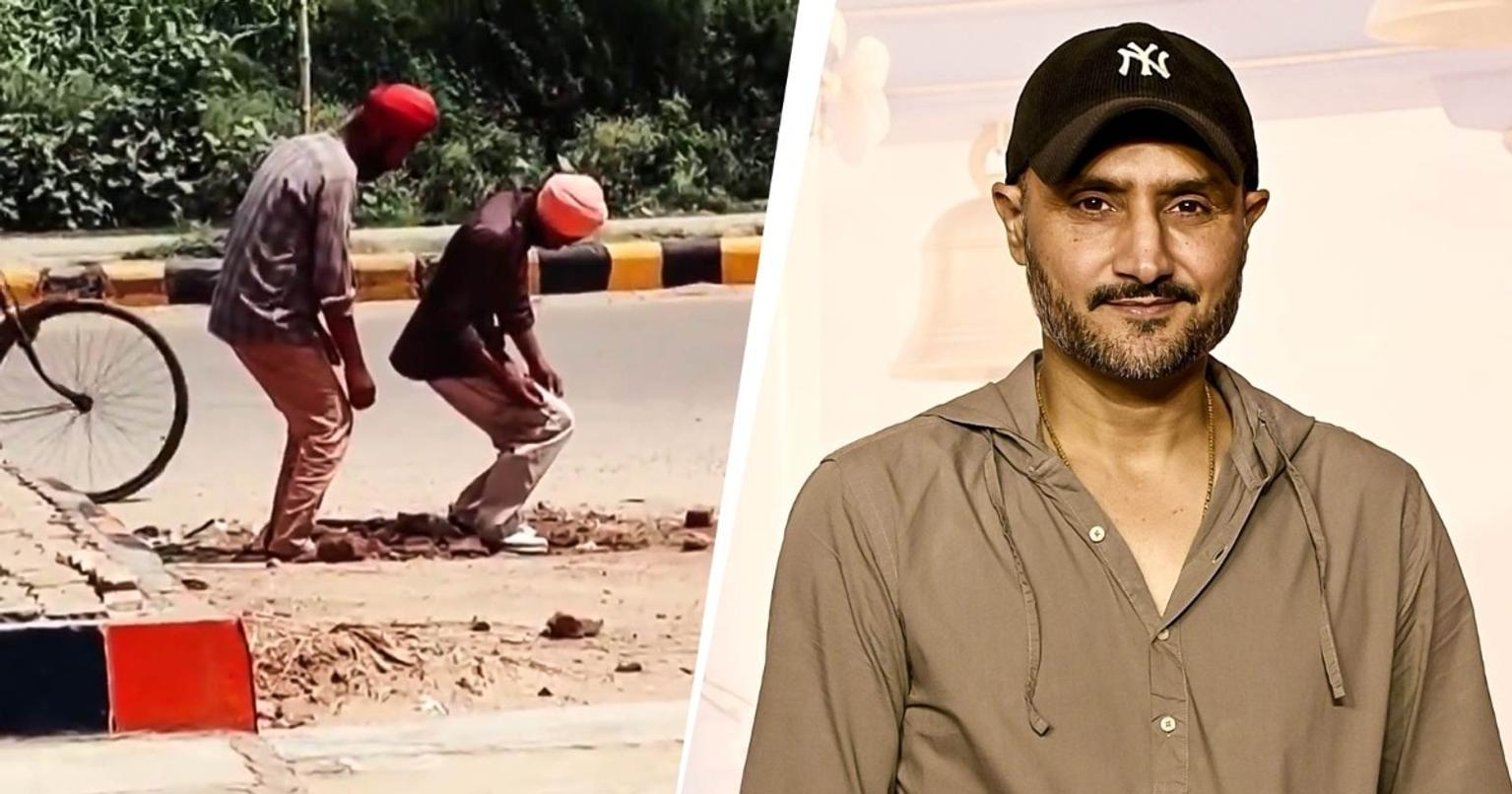 Two turbaned men behaving erratically on a roadside in Rajasthan