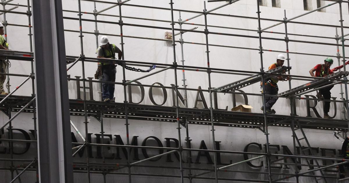 Workers remove Trump’s name from Kennedy Center after court ruling