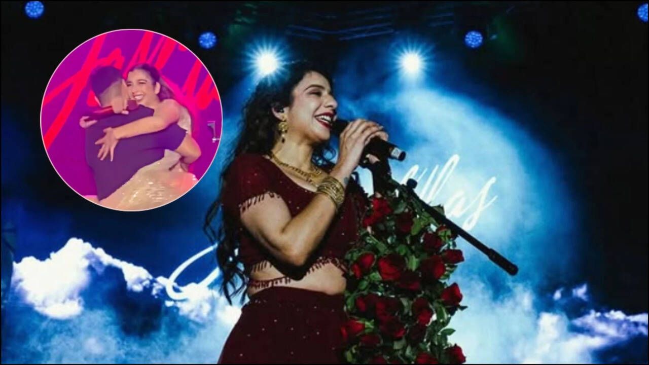 Jasmine Sandlas on stage with engagement ring
