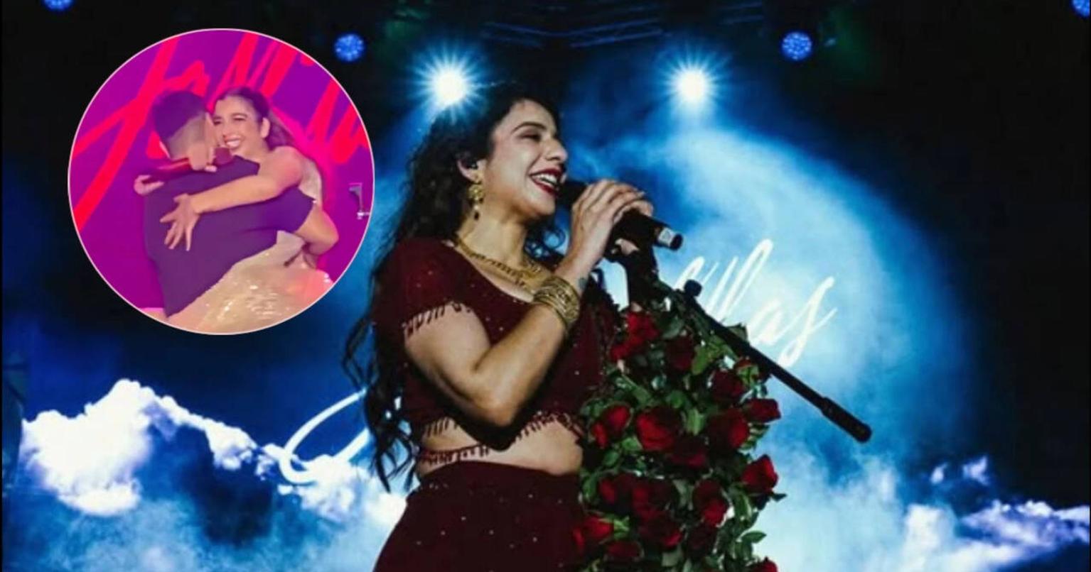Jasmine Sandlas on stage with engagement ring