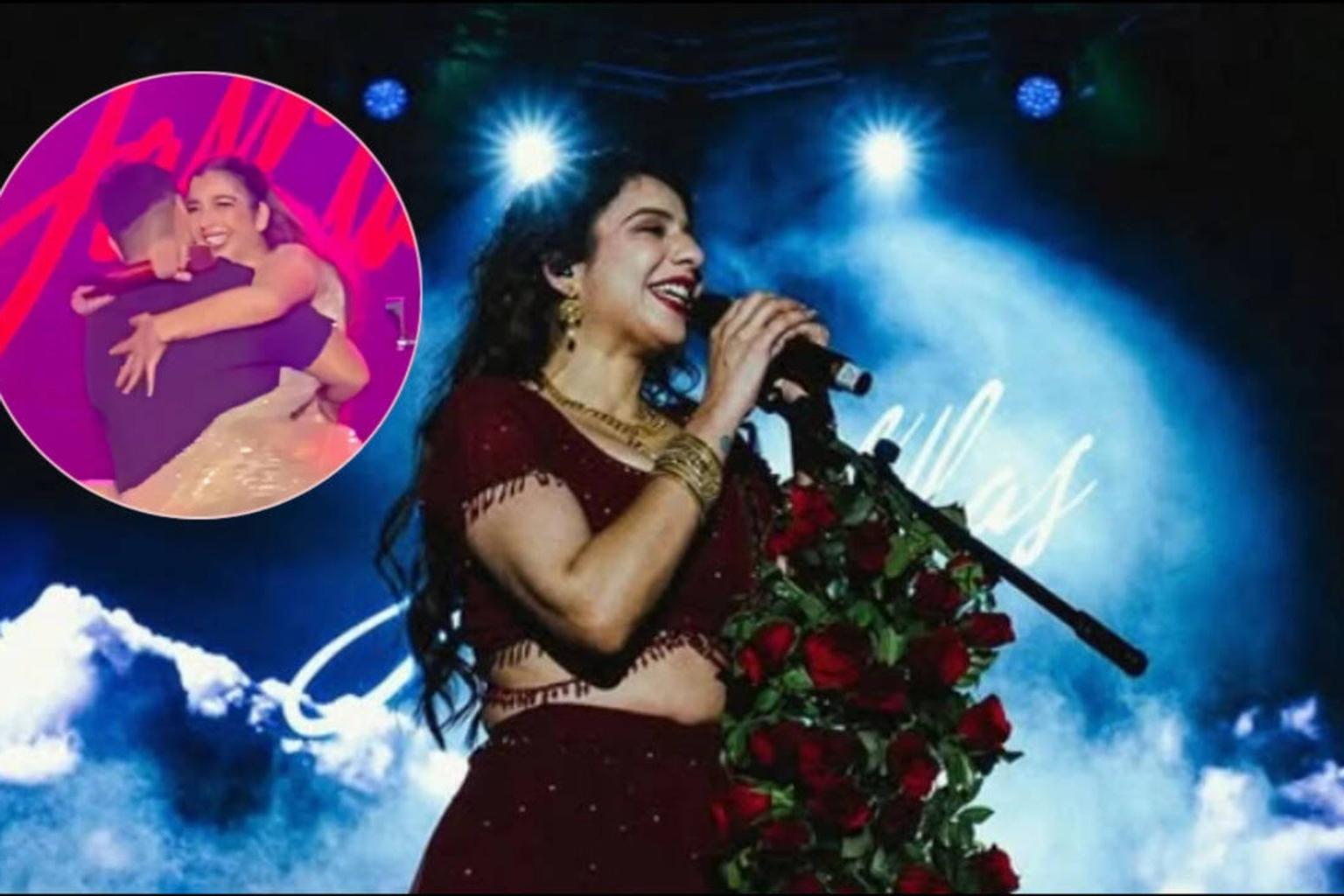 Jasmine Sandlas on stage with engagement ring