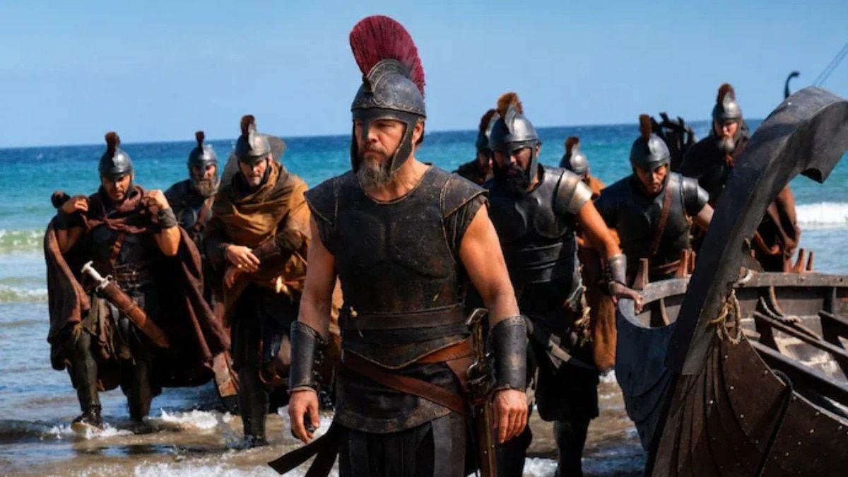 People watching The Odyssey movie in a theater