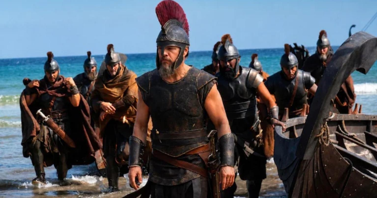 People watching The Odyssey movie in a theater