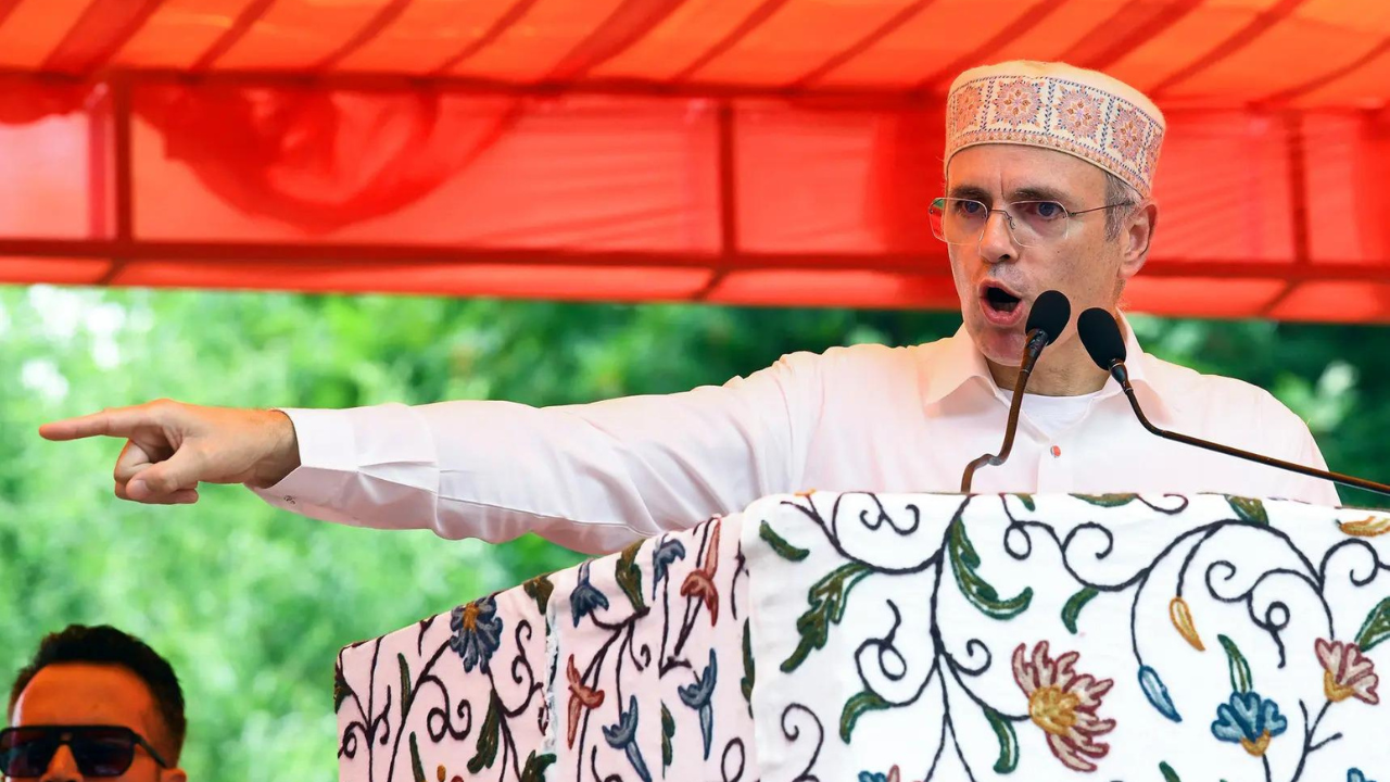 Omar Abdullah speaking at a press conference in New Delhi