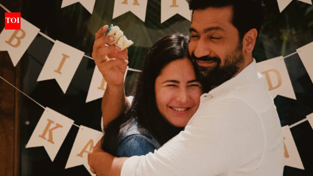 Vicky Kaushal and Katrina Kaif cuddling and smiling