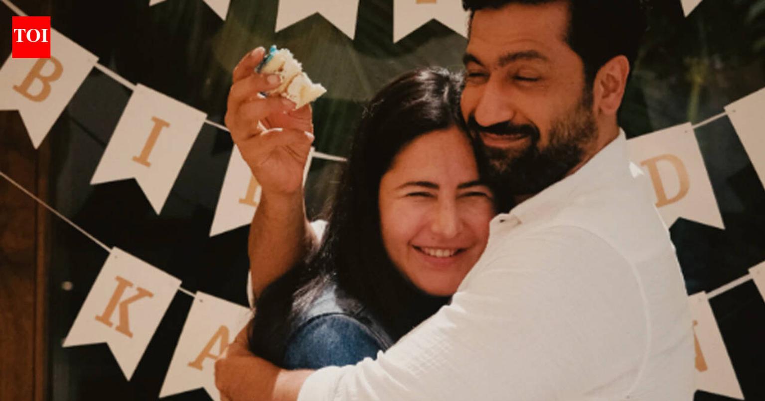 Vicky Kaushal and Katrina Kaif cuddling and smiling