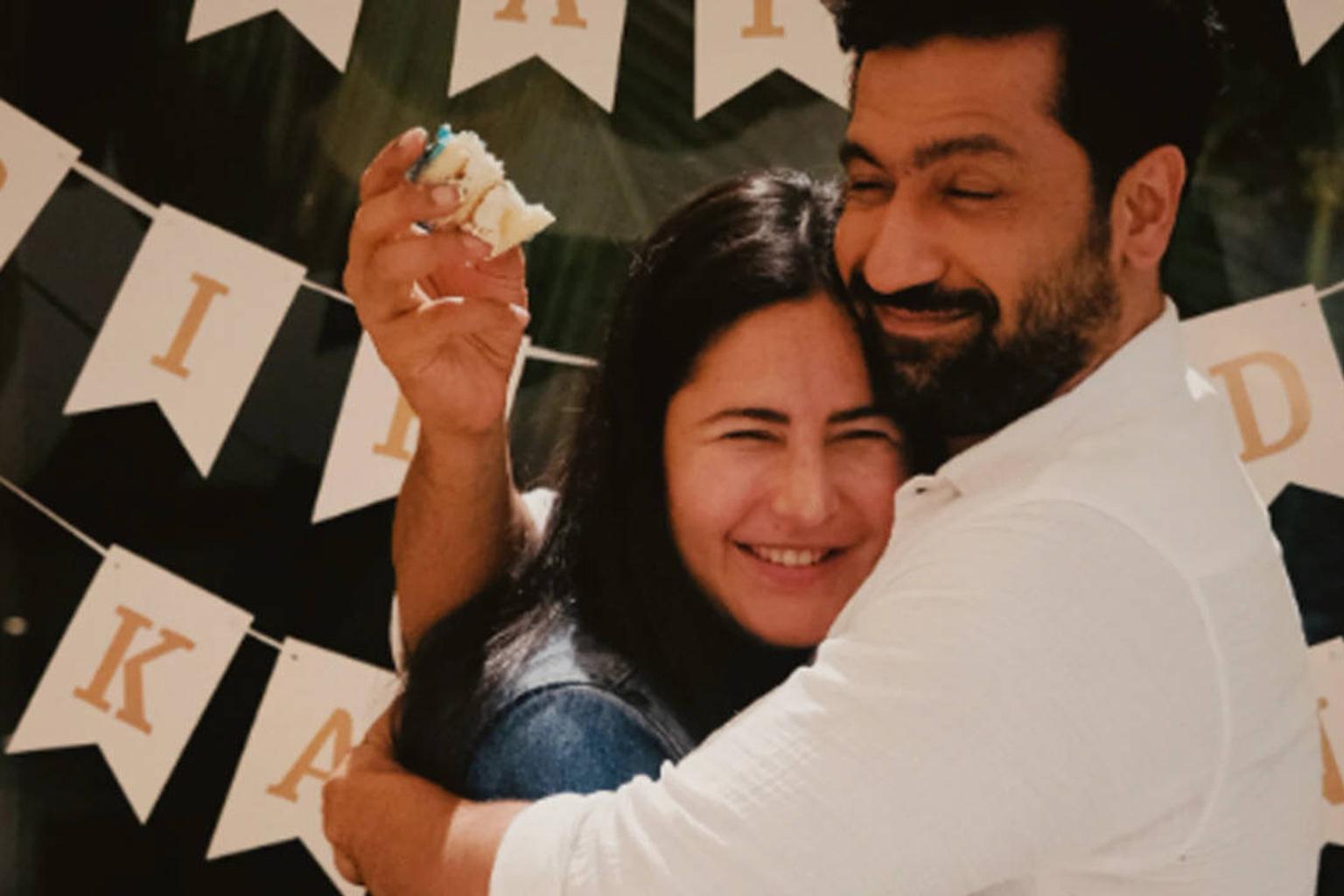 Vicky Kaushal and Katrina Kaif cuddling and smiling