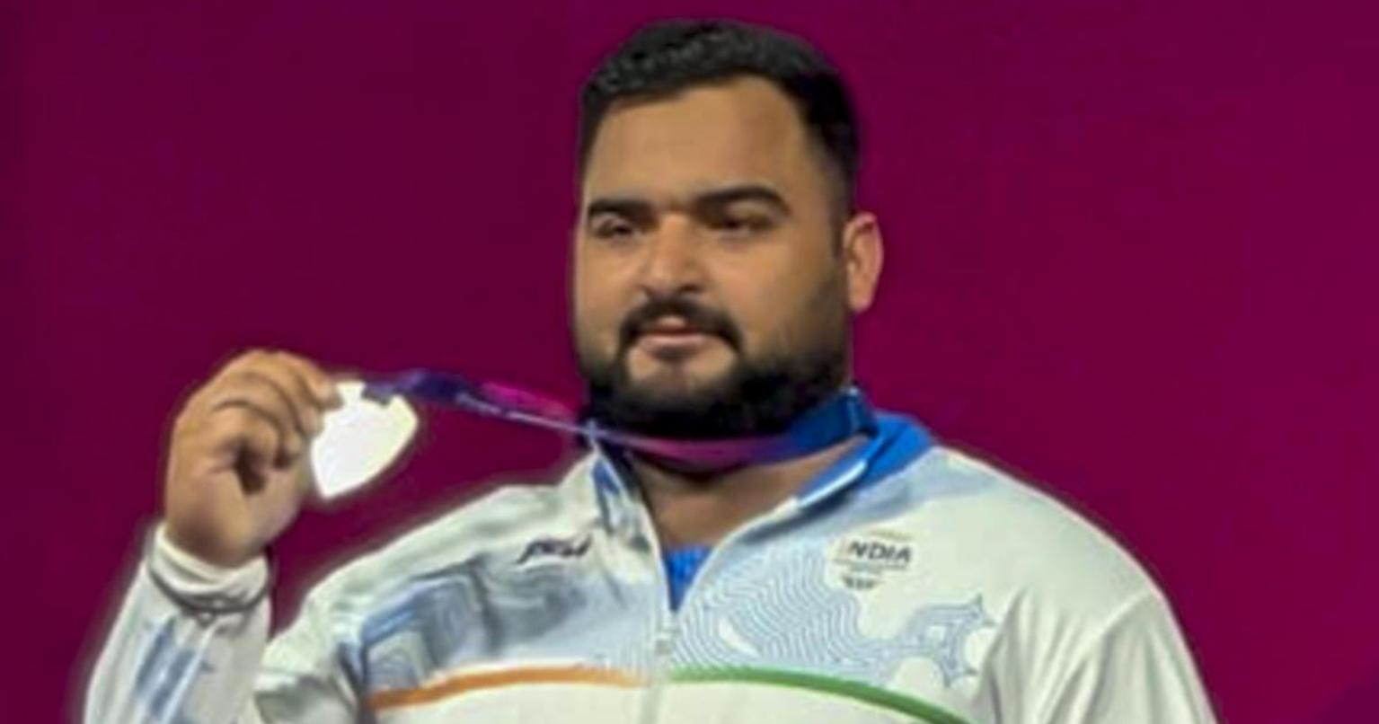Indian athletes competing in weightlifting and discus throw events