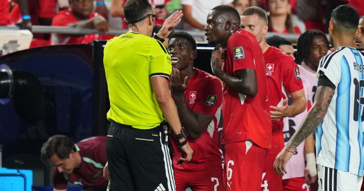 Breel Embolo being shown a red card by the referee